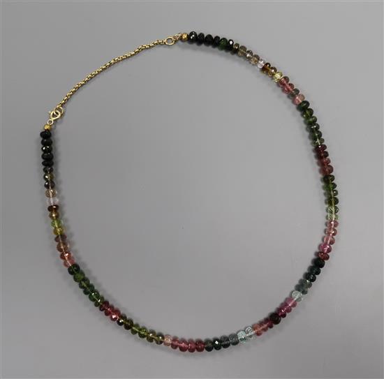 A 9ct gold and multi facetted gem set bead necklace, 46cm approx.